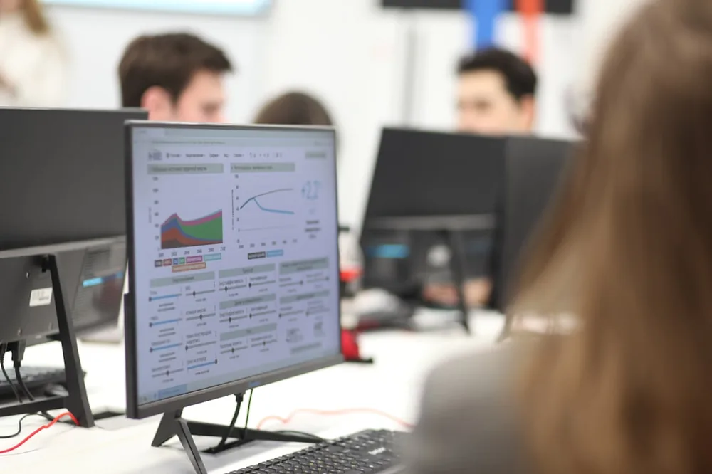 A side view of a screen in the classroom representing climate change statistics